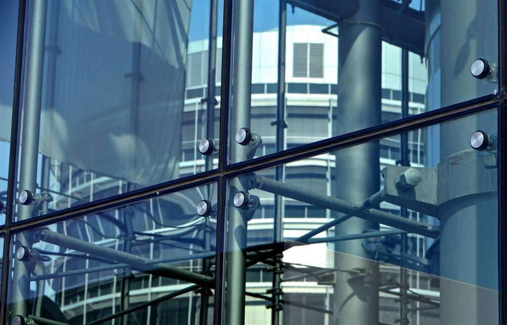 Premium glass hardware fittings including patch fittings, door closers, handles, and locks for modern homes and commercial spaces.